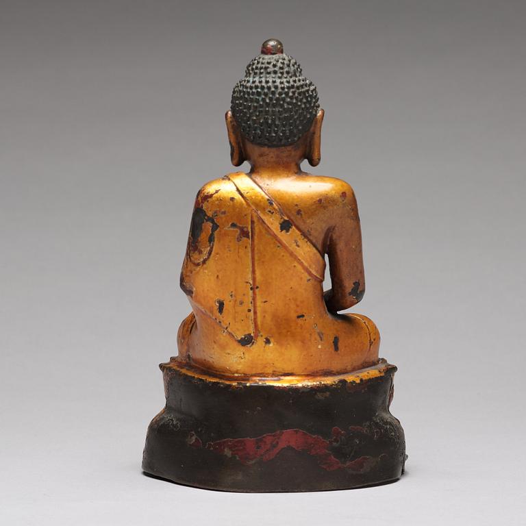 A seated bronze figure of buddha, Ming dynasty (1368-1644).