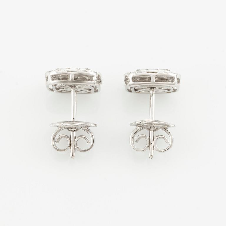 Earrings with baguette-cut and brilliant-cut diamonds.