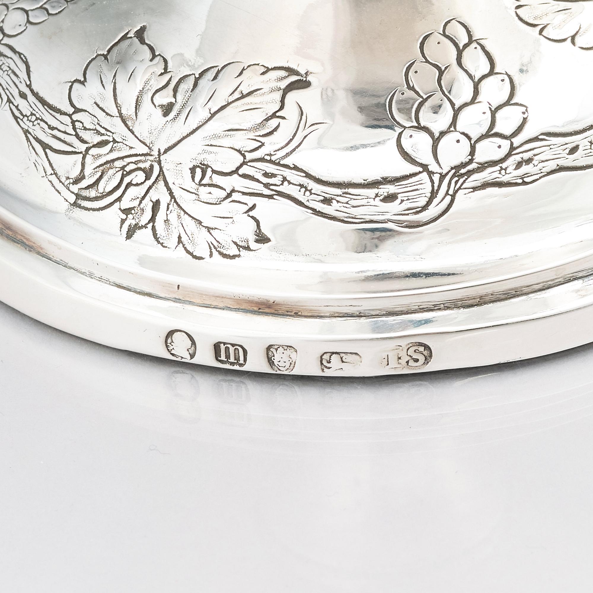 A George III sterling silver ewer, marks of John Scofield, London 1787.