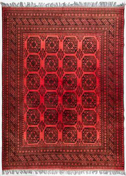 An Afghan carpet, old. Circa 255 x 337 cm.