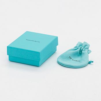 Tiffany & Co, Paloma Picasso, "Melody" hoop earrings in 18K gold.