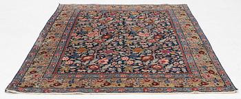 A rug, possibly Tabriz, c. 195 x 137 cm.