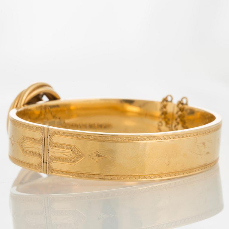 Möllenborg armring 18K guld med en gammalslipad diamant samt pärlor och svart emalj.