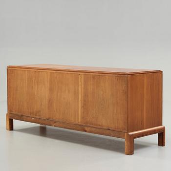 NILS AHRBOM & HELGE ZIMDAHL, a walnut sideboard, Stockholm 1932.