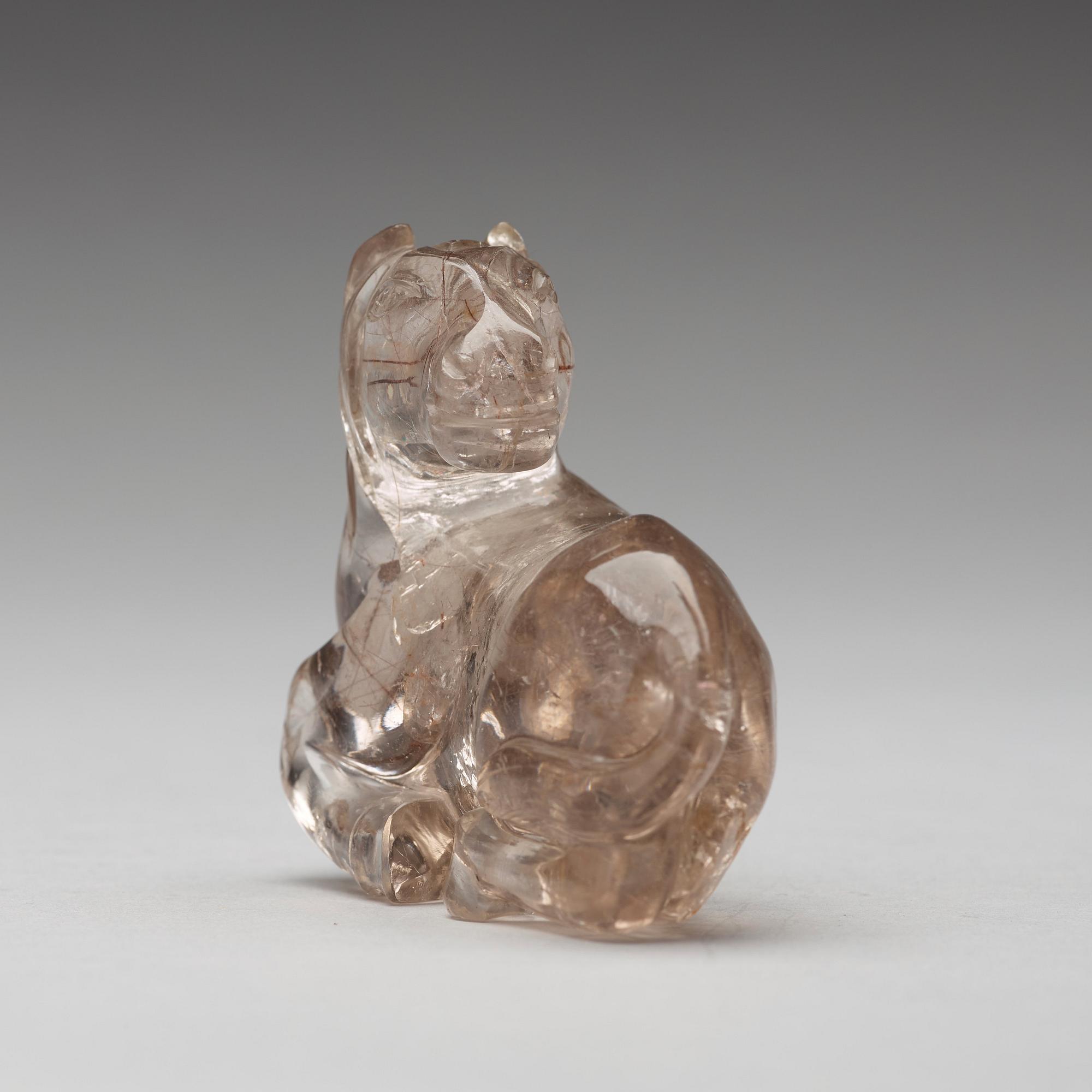 A quartz carving of a reclining horse, China.