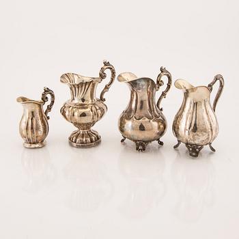 A set of four Swedish 19th century silver creamer.