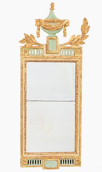 A gilded and painted Louis XVI mirror.