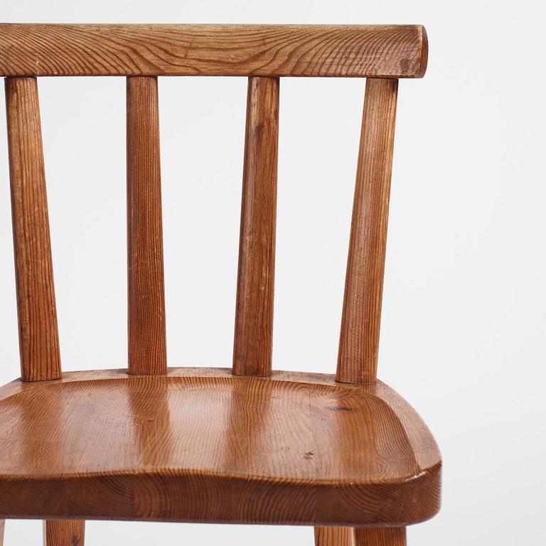 Axel Einar Hjorth, a set of six "Utö" stained pine chairs, Nordiska Kompaniet 1930s.