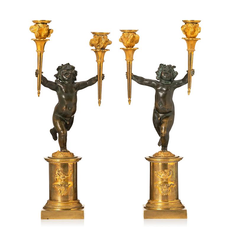 A pair of Louis XVI candelabra.