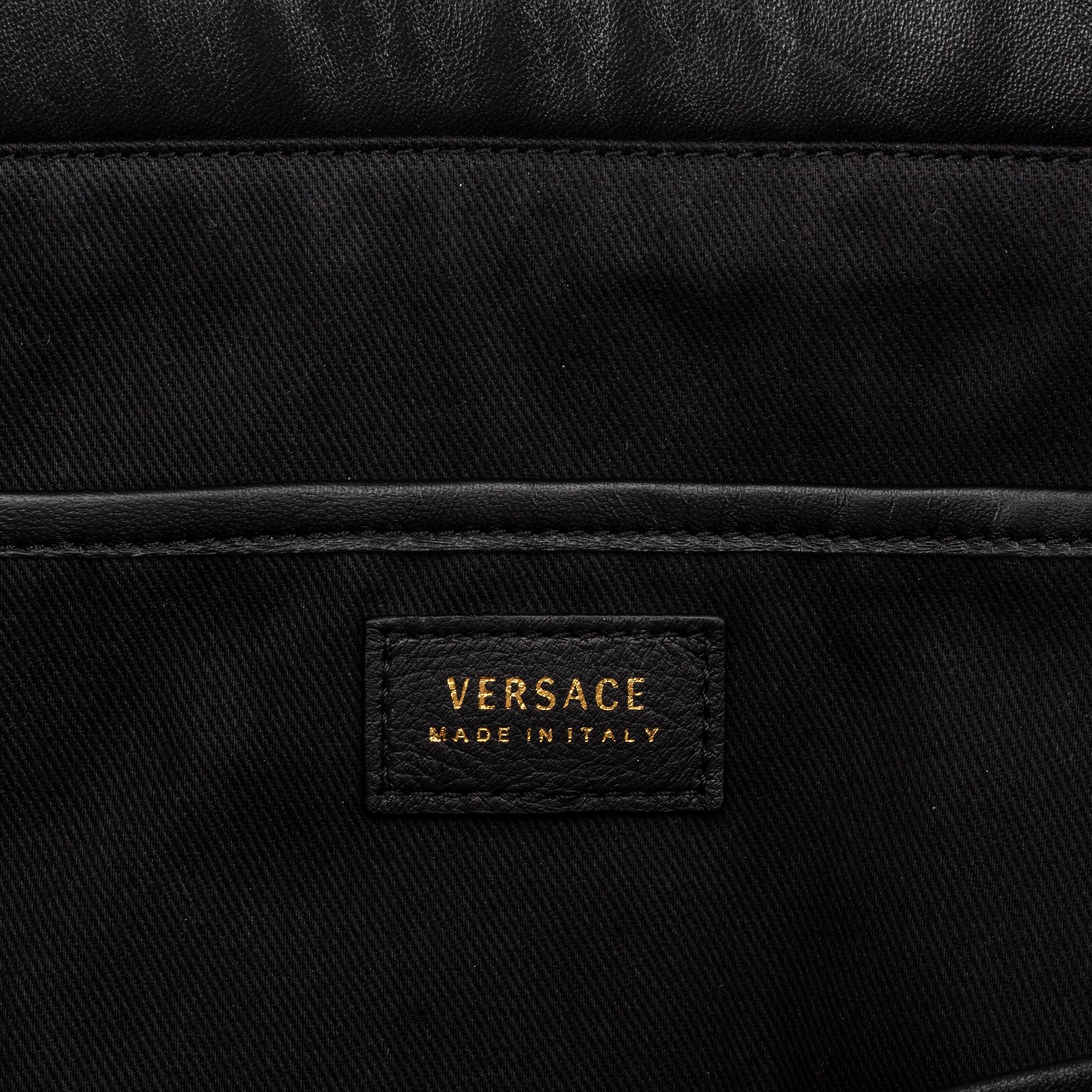 Versace, a black quilted leather handbag.
