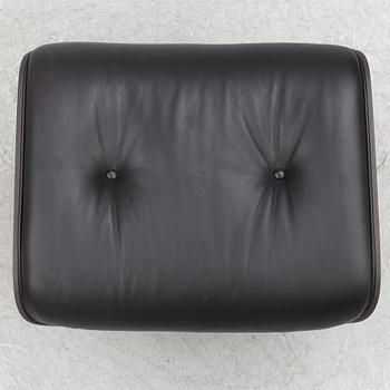 Charles & Ray Eames, an "Eames Lounge Chair" with ottoman, Vitra, 21st century.