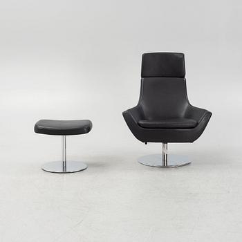 Roger Persson, a 'Happy Swing' armchair and a foot stool, Swedese, 21st Century.