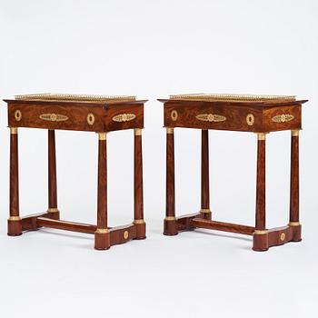 A pair of French Empire gilt bronze-mounted mahogany jardinieres, first half of the 19th century.