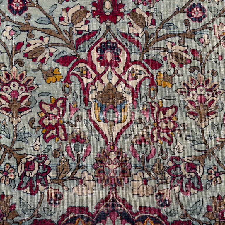 An antique Isfahan carpet, circa 342 x 250-260 cm.