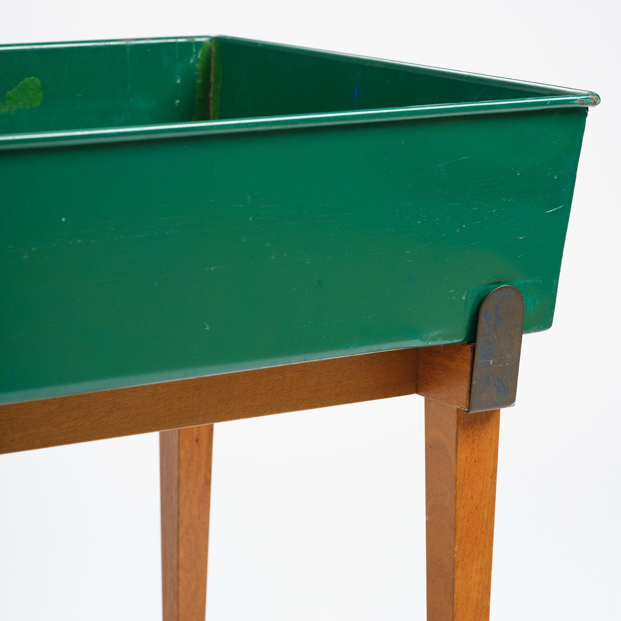 Josef Frank, a rare flower table with green lacquered box model "B 2084", Firma Svenskt Tenn, Sweden, 1950-60s.