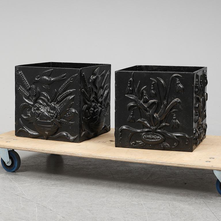 A pair of cast iron garden plant pots, 20th Century.