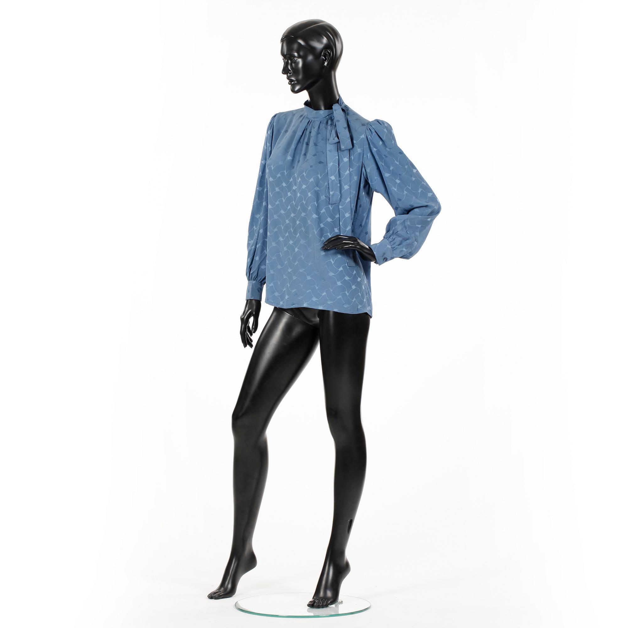 YVES SAINT LAURENT and GUY LAROCHE, three silk blouses.