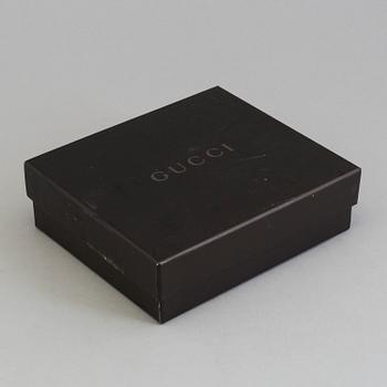 SKÄRP, Gucci.