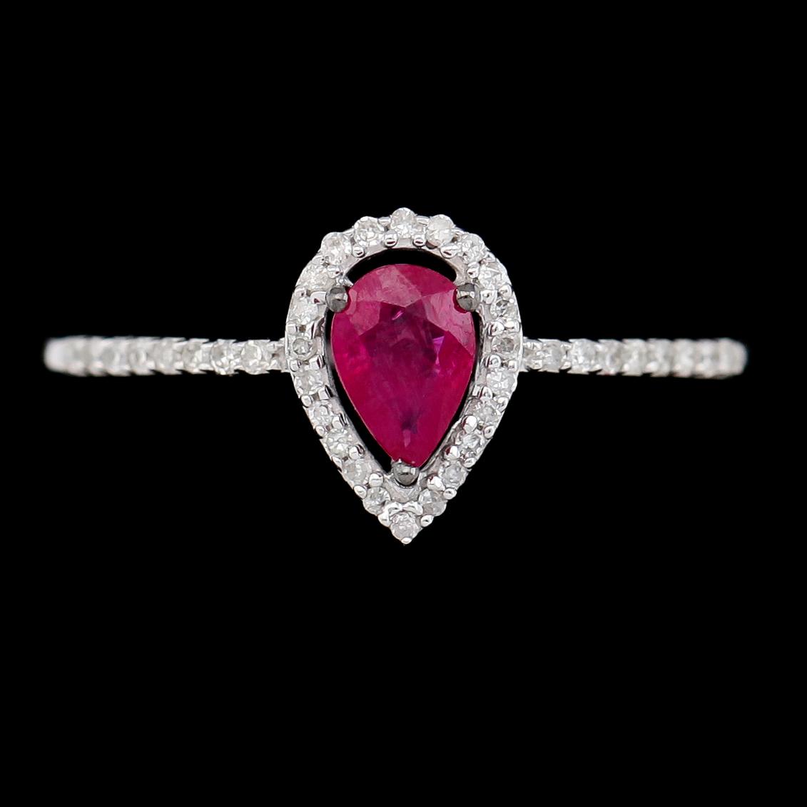 RING, 14K vitguld, rubin ca 0.50 ct och diamanter tot ca 0.12 ct.