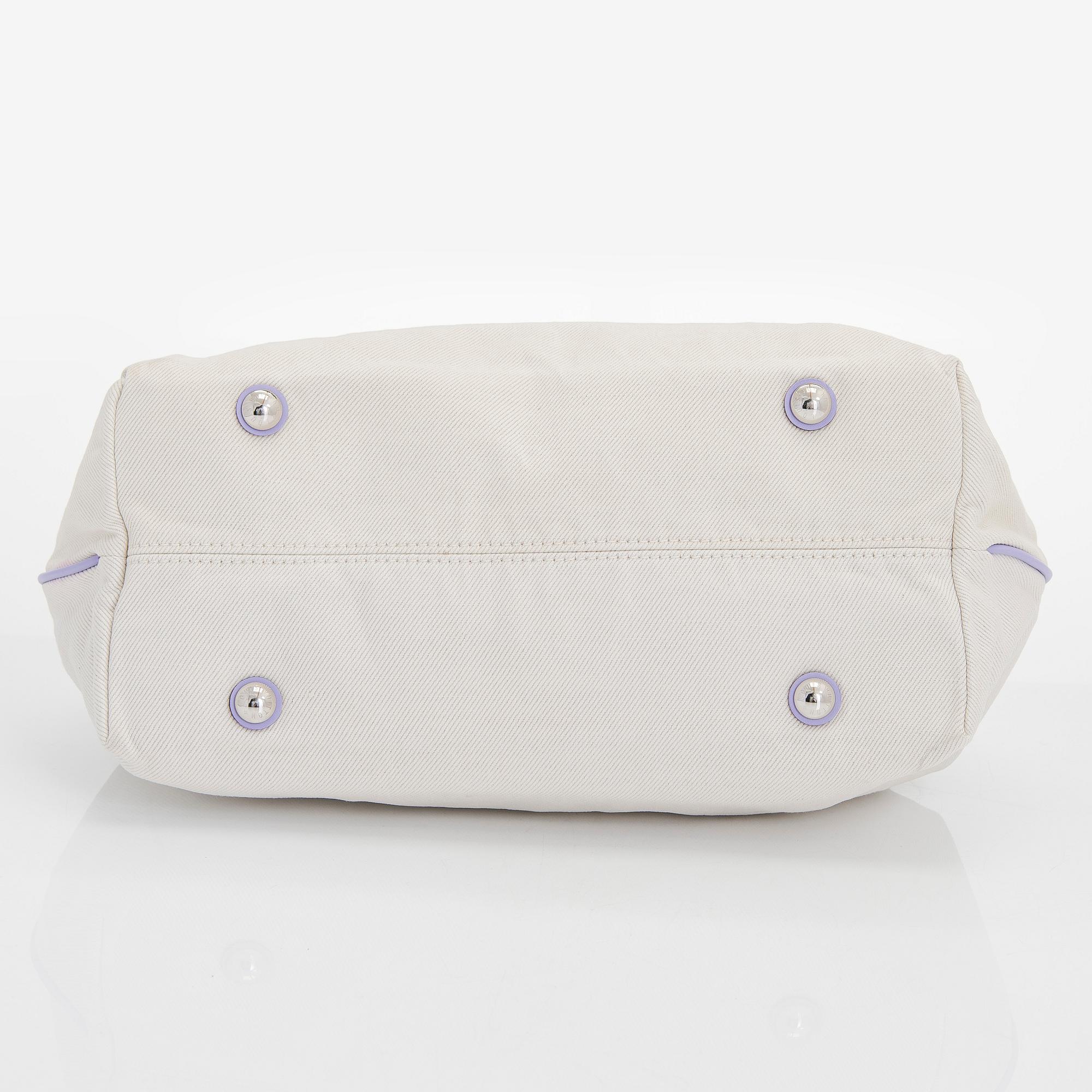 Louis Vuitton, a 'Cotton Canvas Articles De Voyage Cabas GM' bag.