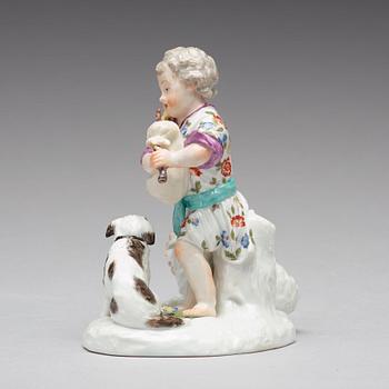 A Frankenthaler porcelain figure of a putto playing bag pipe, Germany, 18th Century.