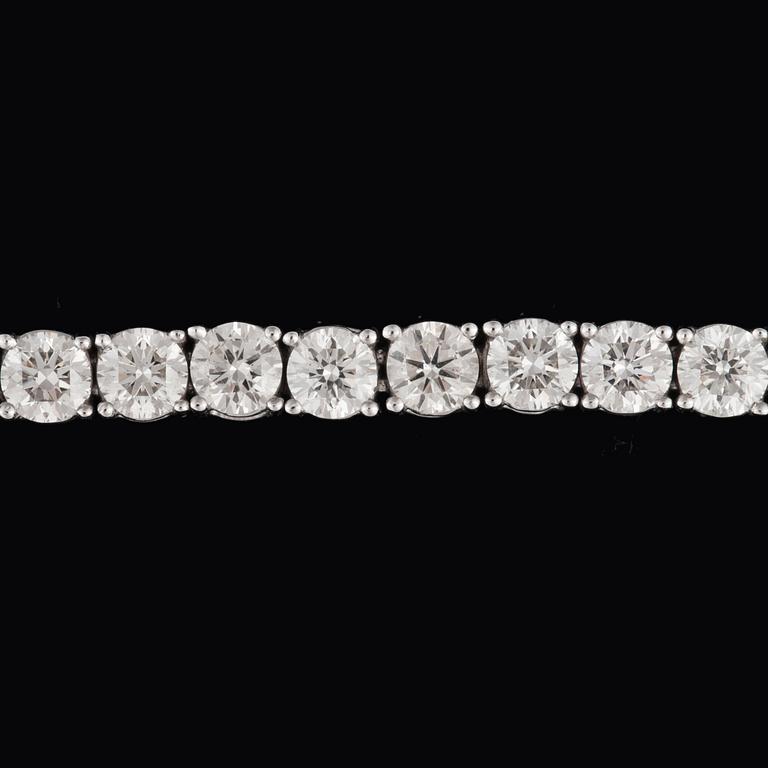 A brilliant-cut diamond, circa 8.20 ct, line bracelet.