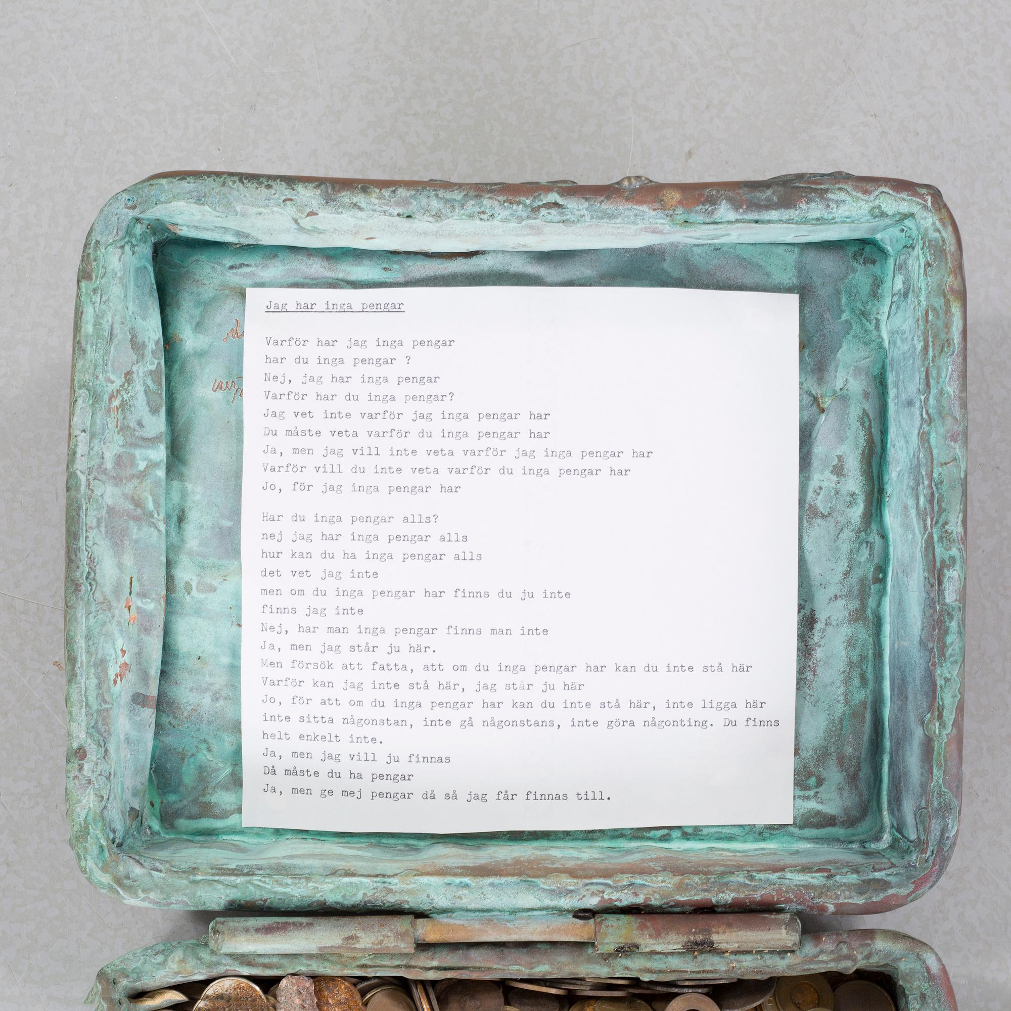 a metal sculpture, signed and dated -83.