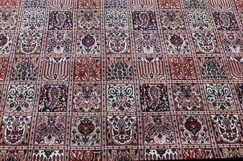 A carpet, Quum, c. 346 x 251 cm.