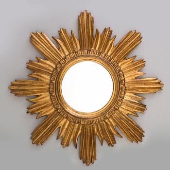 A late 20th Century sun shaped mirror.