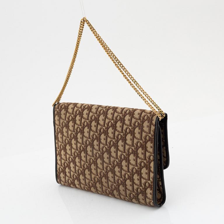 Christian Dior, a brown monogram canvas bag.