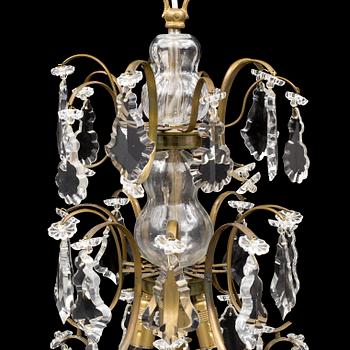 A Rococo style chandelier, mid 20th Century.