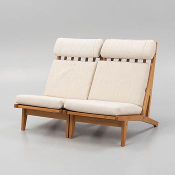 Hans J. Wegner, a pair of "GE375" lounge chairs/sofa, Getama, Denmark, 1970's.