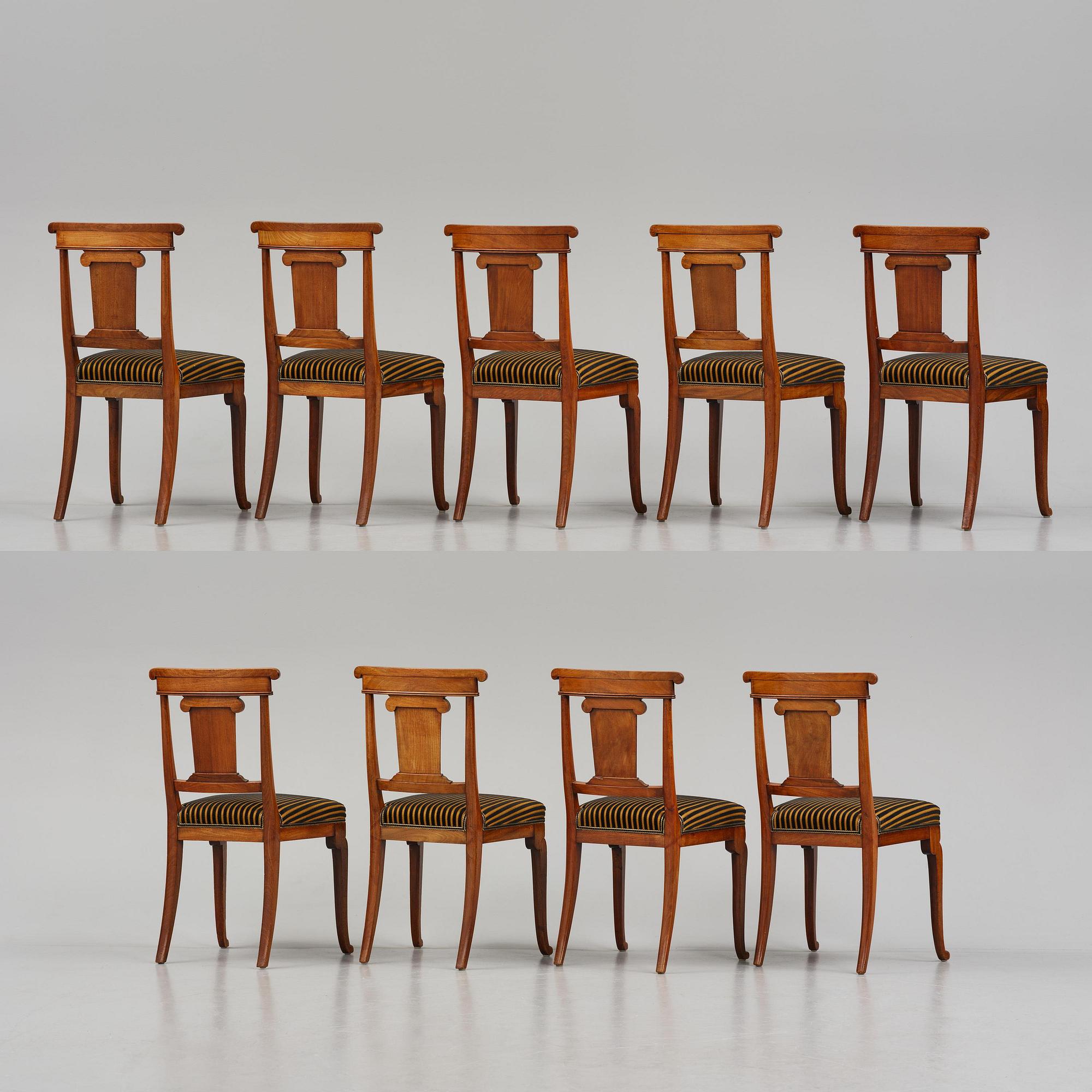 A set of nine Charles X mahogny dining chairs.