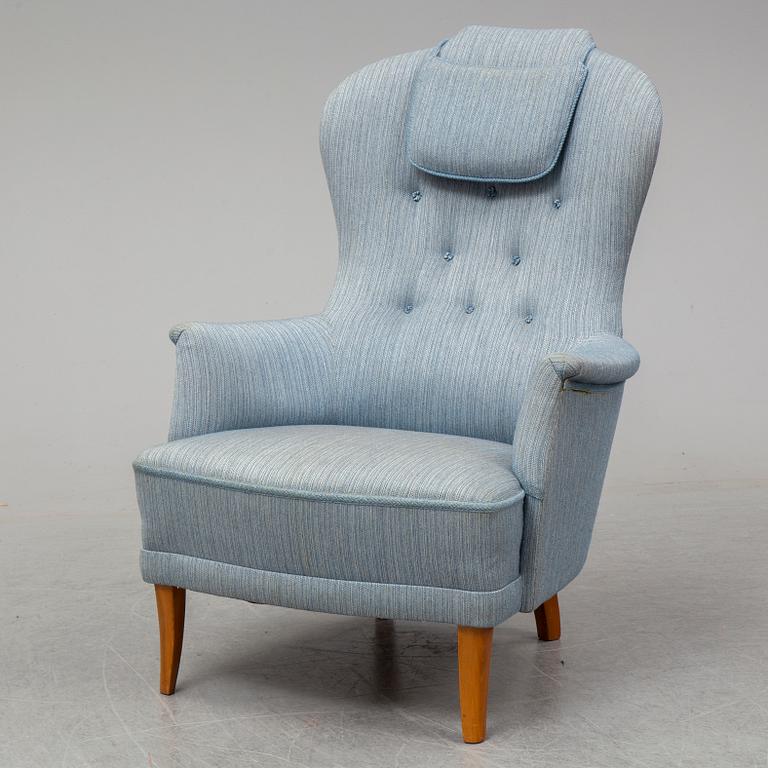 A second half of the 20th Century armchair by Carl Malmsten.
