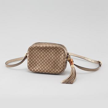 GUCCI, a "Sunshine Camera" bag.