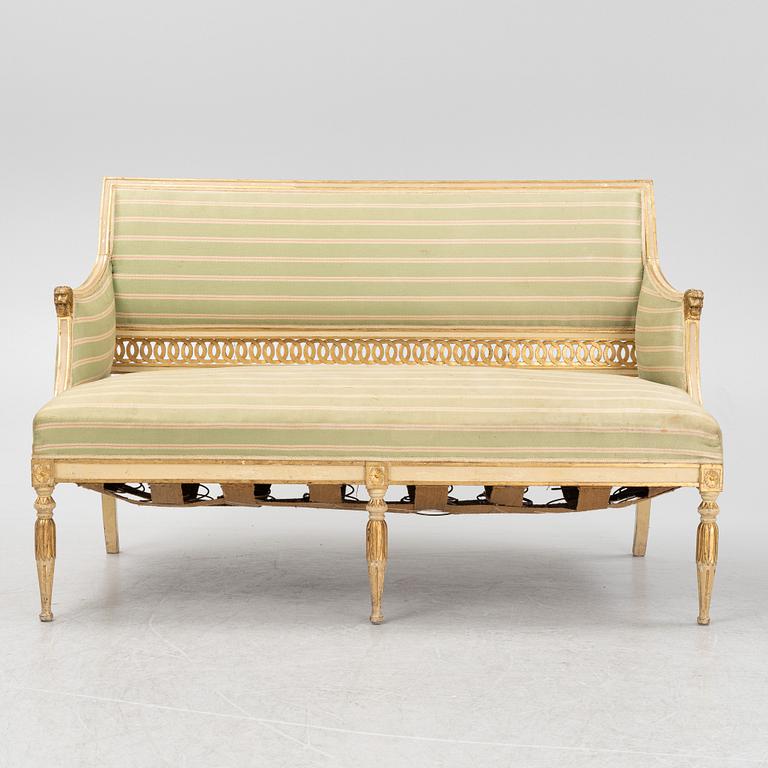 A late Gustaivan style sofa and four matched chairs from around the year 1900.