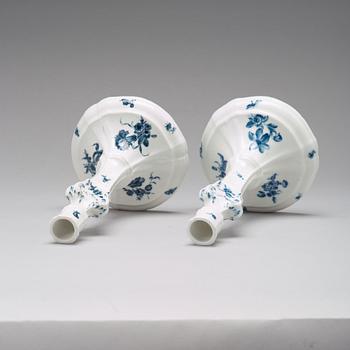 A pair of Berlin porcelain candle sticks, 18th Century.