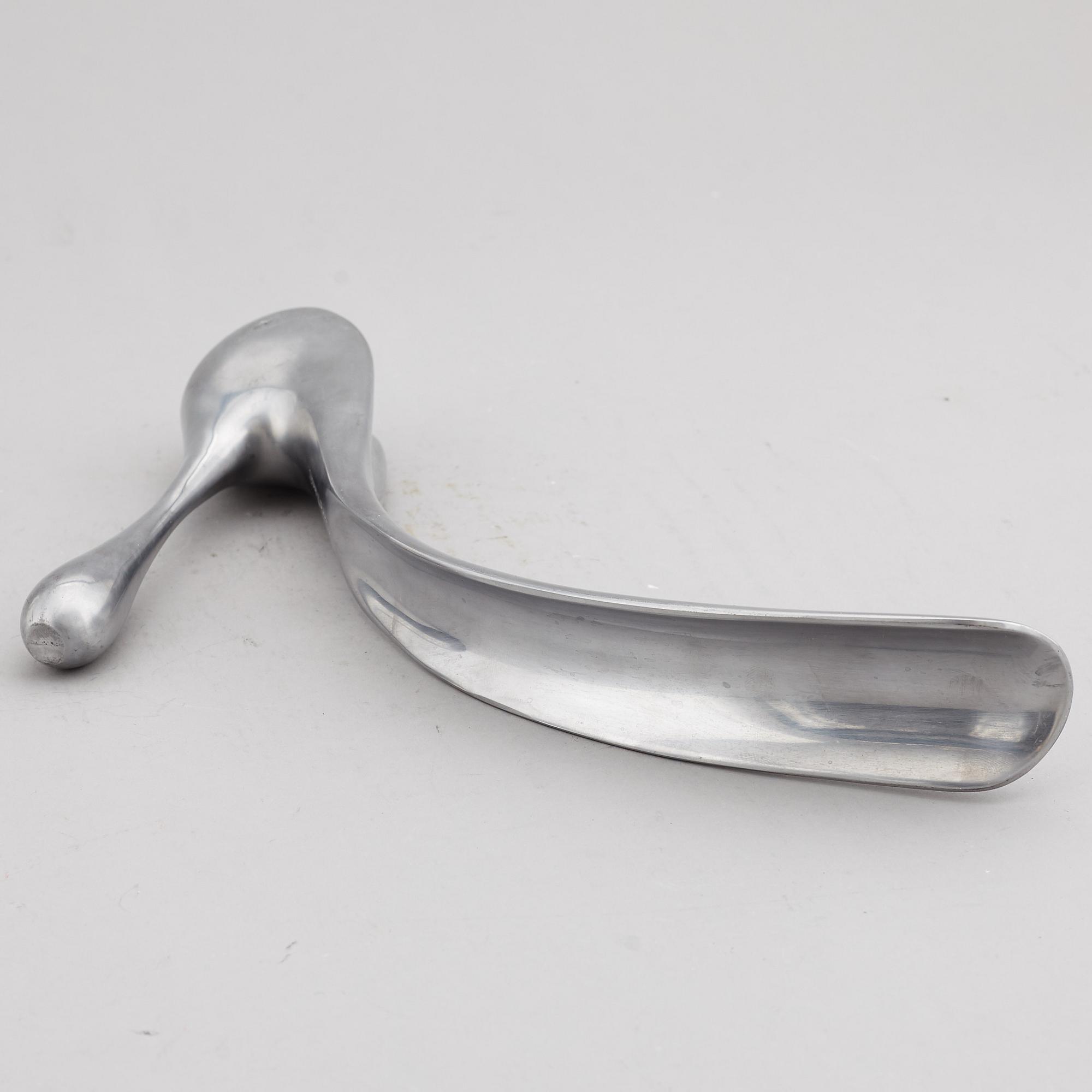 A Manolo Blahnik shoe horn, modern.