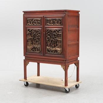 A bar cabinet, purchased in Tokyo around the 1950s. Partly built by late Qing dynasty panels.