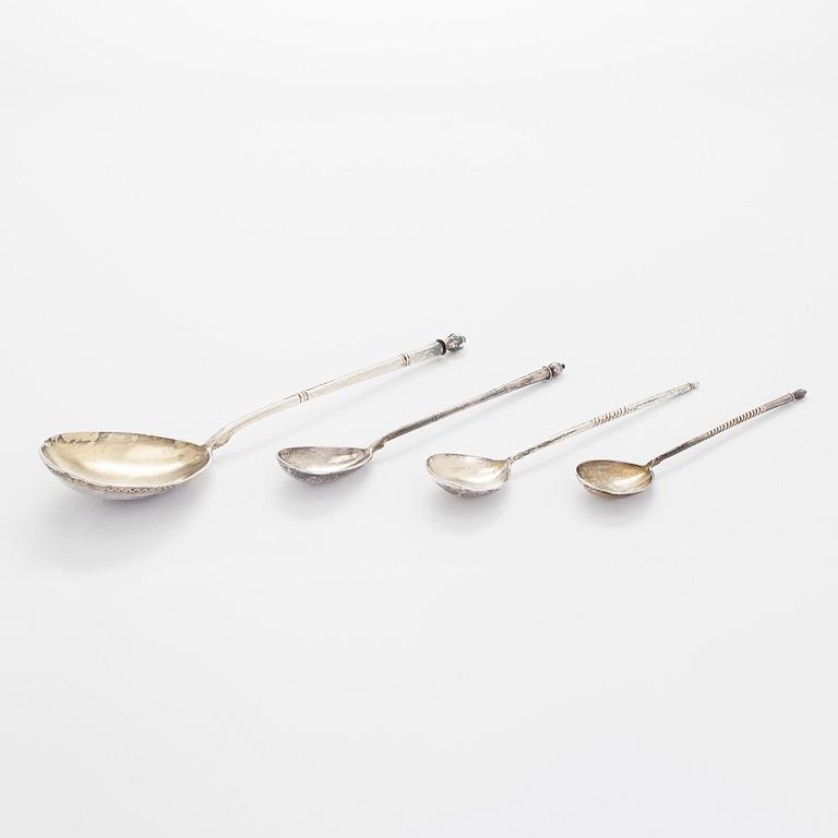 Three silver tea glass holders and four spoons, silver Kostroma and Moscow, late 19th and early 20th centuries.