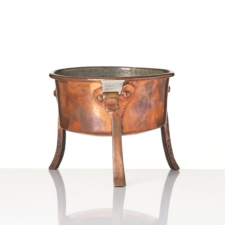A copper saucepan, 18th century.
