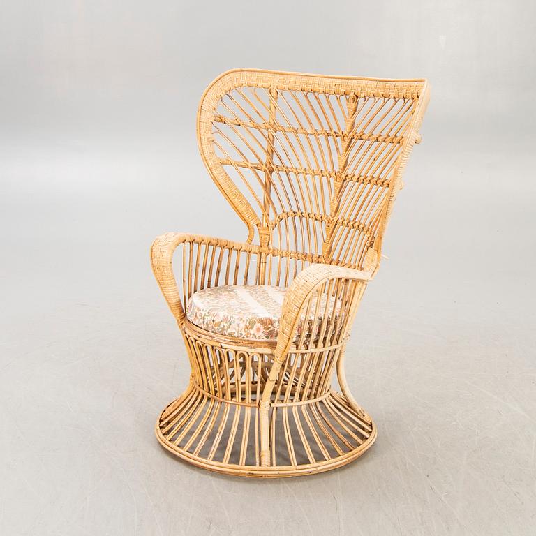 Gio Ponti & Lio Carminati,  a wifker chair for Boncina Itly alter part of the 20th century.