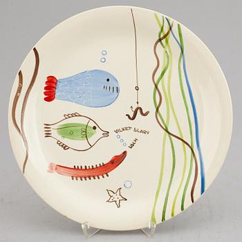 STIG LINDBERG, A set of 12 "Löja" creamware plates, Gustavsberg, Sweden.
