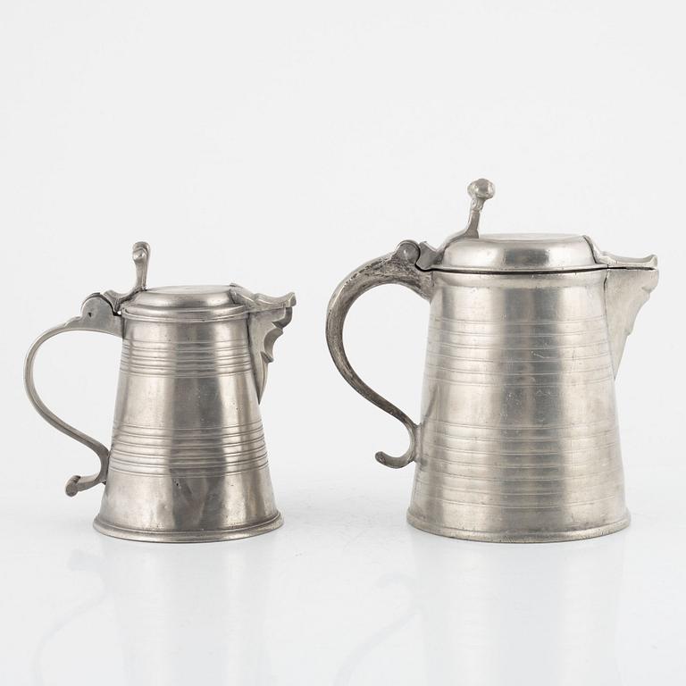 Two pewter jugs, mark of O. Artedius and S. Pilström, Jönköping 1761 respectively Örebro 1772.