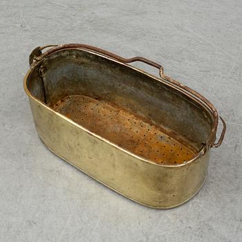 A 19th century brass fish pan.