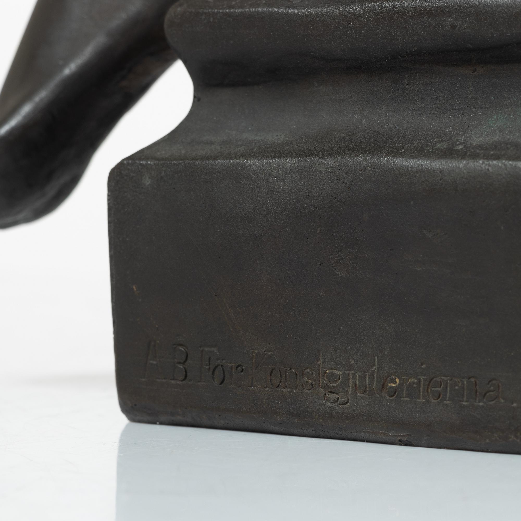 Alice Nordin, seated female figure.