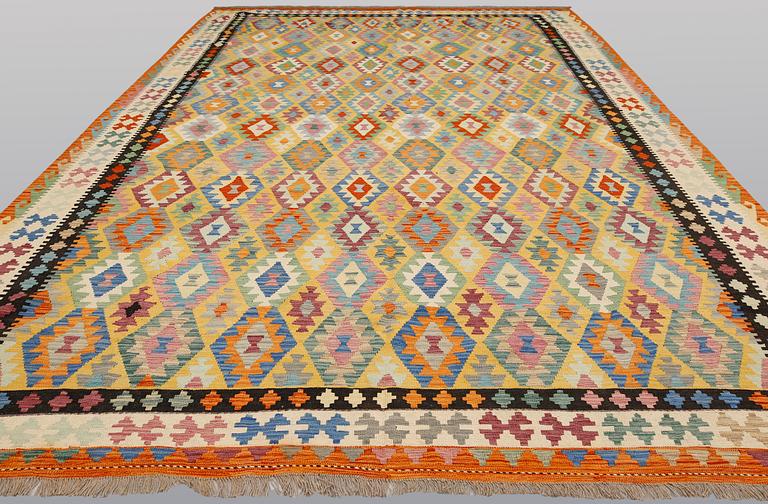 A kilim carpet, ca 486 x 304 cm.