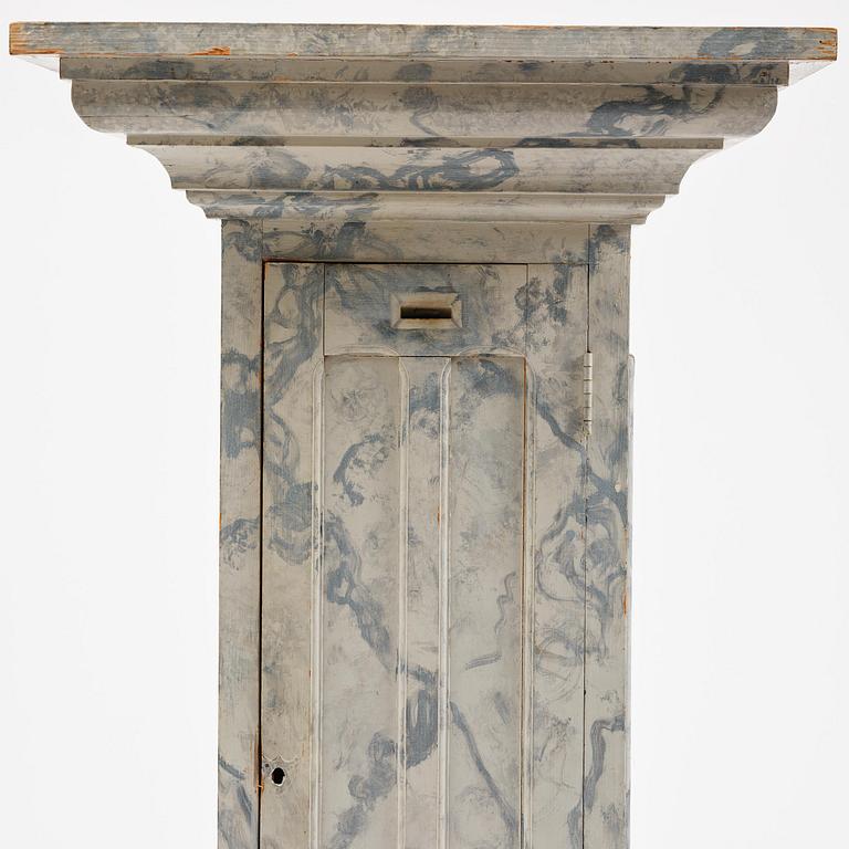 A Swedish column-shaped cabinet late 19 th century.