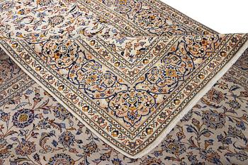 A Kashan carpet, c. 380 x 271 cm.