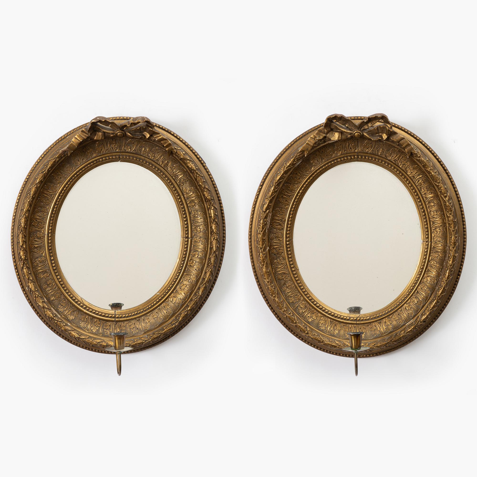 A pair of gilt-gesso one-branch girandole mirrors, later part 19th century.